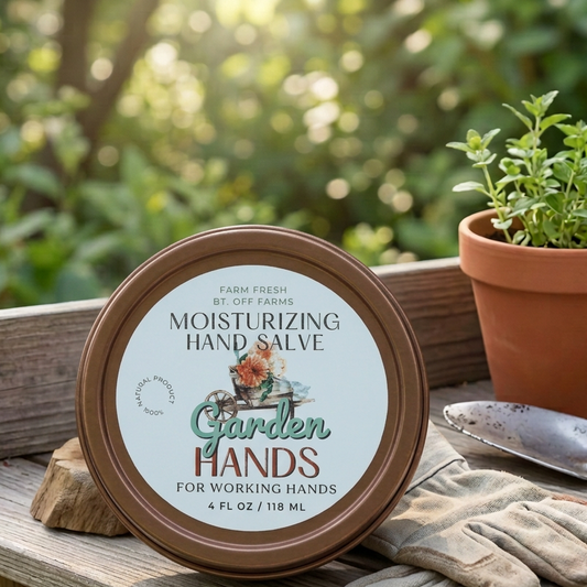 Garden Hands salve tin standing upright with its label facing directly forward
